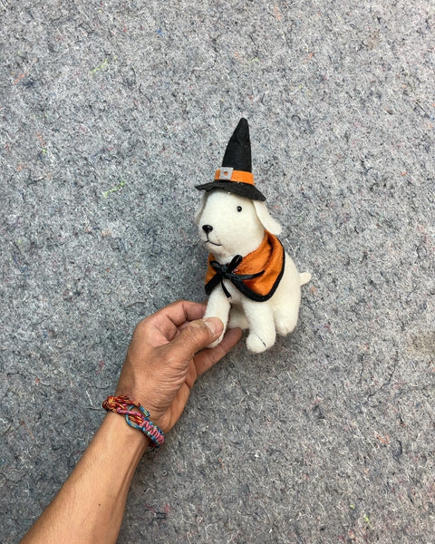 White Plush Dog with Witch Hat and Orange Cape