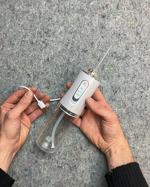 Portable White Cordless Water Flosser with USB Charger