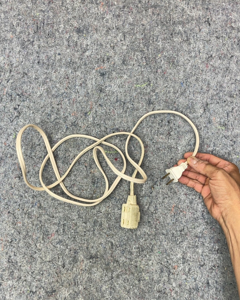 White Extension Cord with Three Outlets