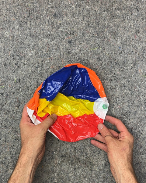 Deflated Multi-Color Beach Ball