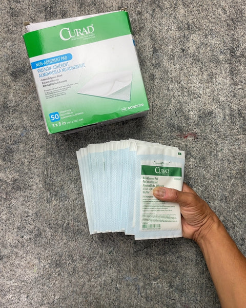 Grip of Curad Non-Adherent Sterile Pads