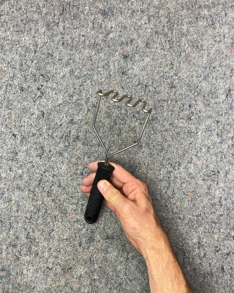 Metal Potato Masher with Black Handle
