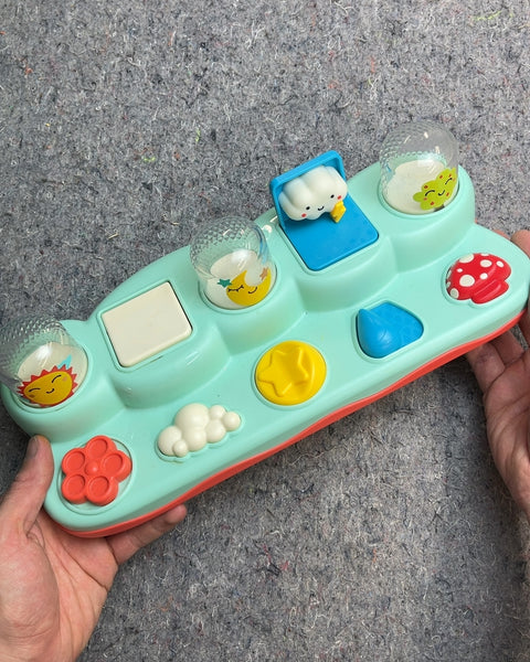 B. toys Pop-Up Buddies Cause & Effect Toy