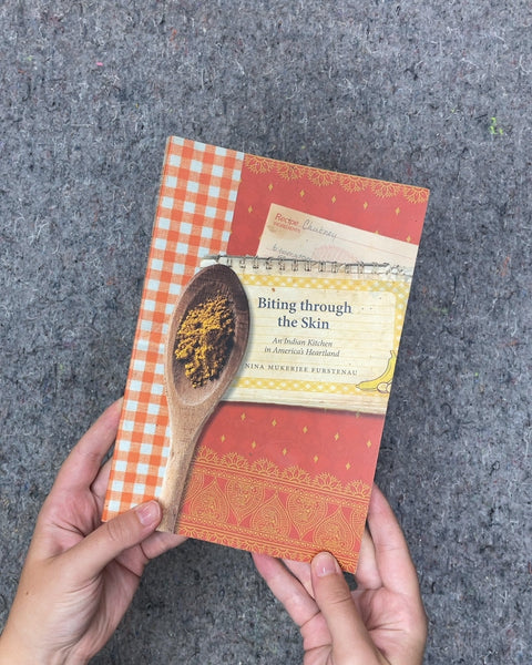Biting Through the Skin by Nina Mukerjee Furstenau