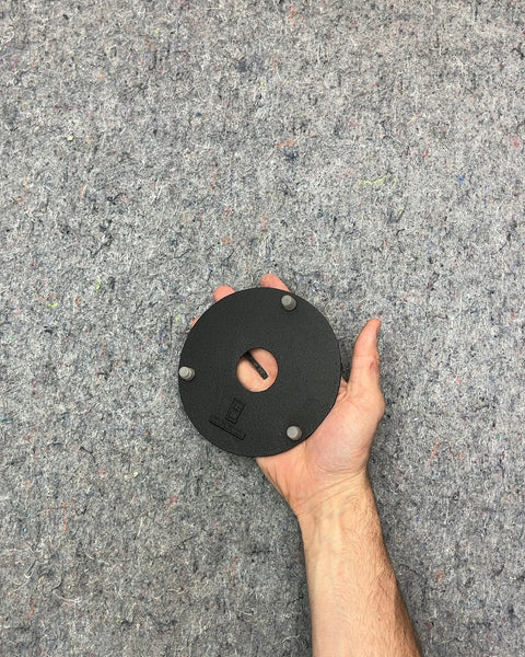 Black Round Cast Iron Trivet For A Teapot