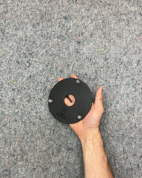 Black Round Cast Iron Trivet For A Teapot