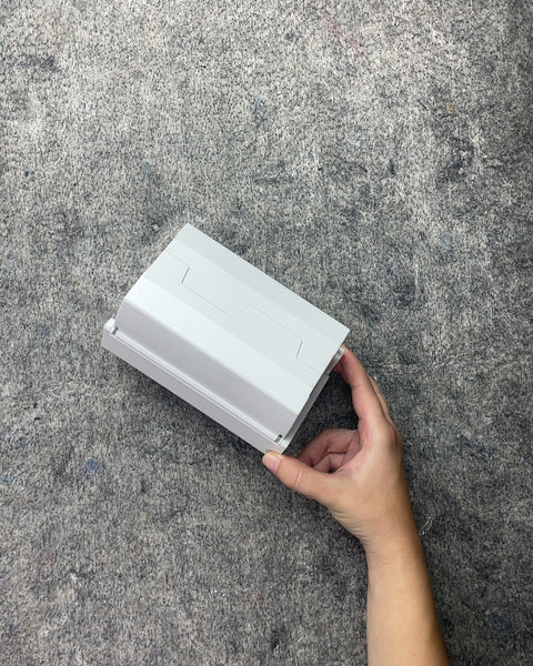 White Plastic Outlet Cord Cover