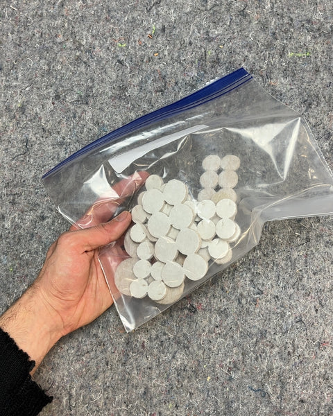 Bunch Of Felt Furniture Pads Of Various Sizes