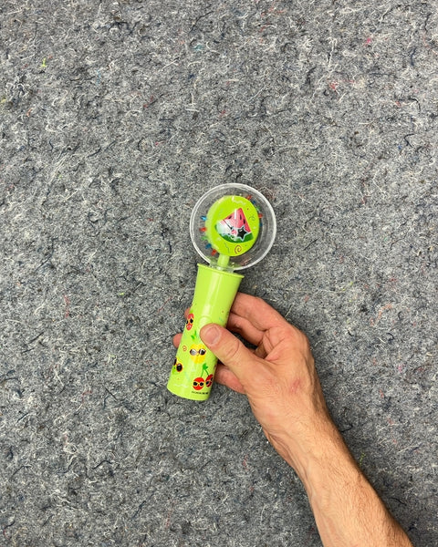 Green Light-Up Spinning Toy Wand