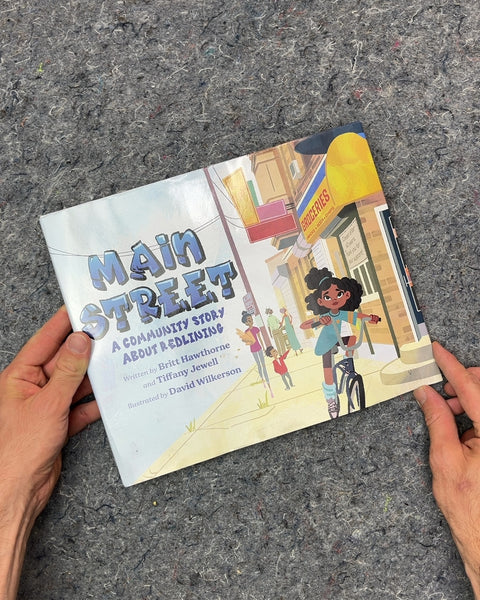 Main Street: A Community Story About Redlining by Britt Hawthorne and Tiffany Jewell