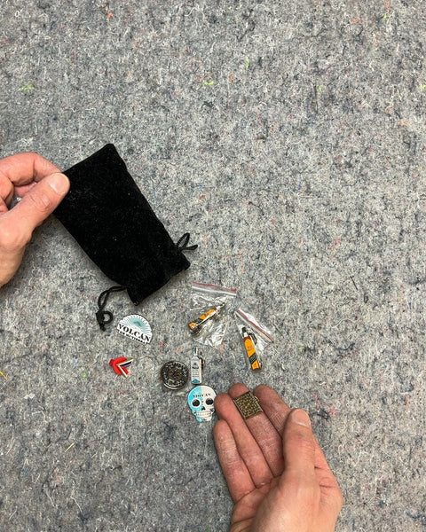 A Collection Of Pins From Someone Who Worked In Bars