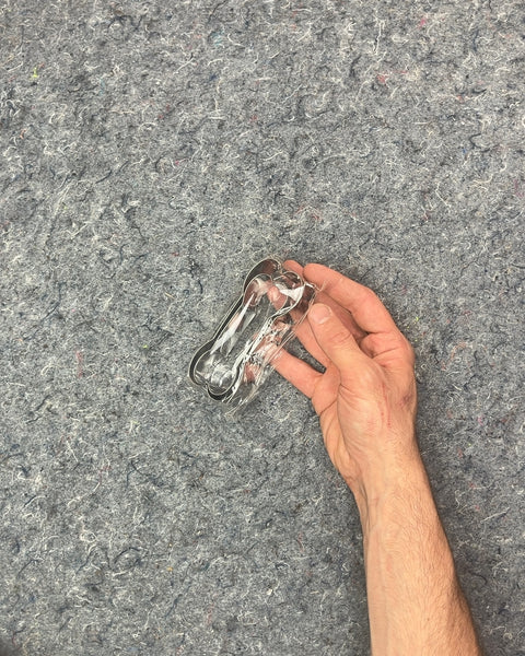 Two Cookie Cutters Shaped Like Dog Bones