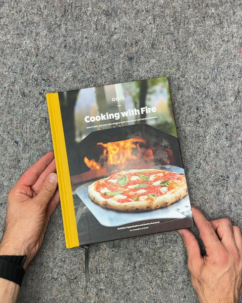 Ooni Cooking with Fire Cookbook by Kristian Tapaninaho and Darina Garland