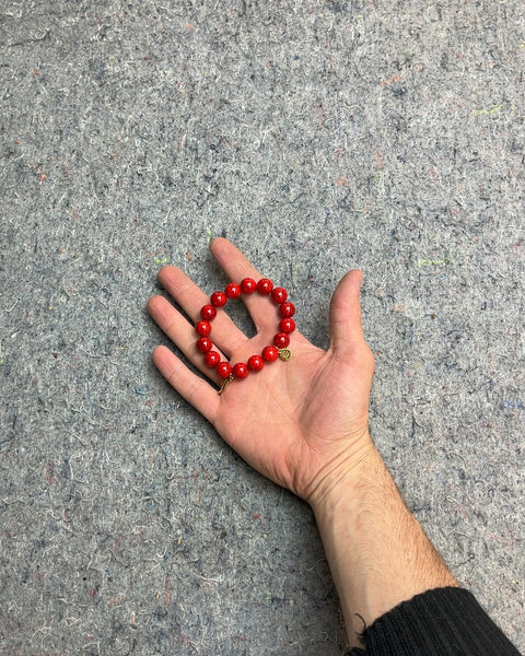 Red Beaded Bracelet with Golden Charm