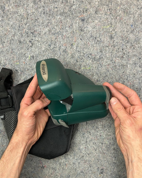 Polaroid OneStep Express Instant Camera with Bag, Plastic Handle On The Side Is Broken
