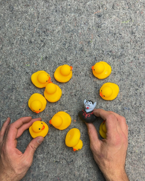 Bunch Of Cute Rubber Duckies And A Vampire One