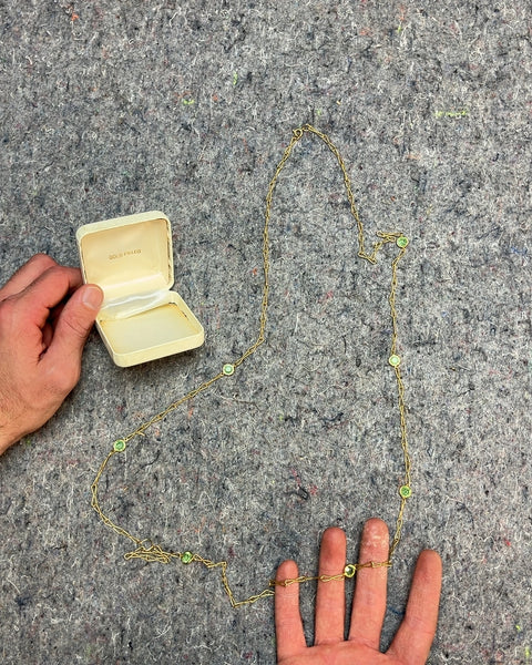 Golden Necklace with Green Stones