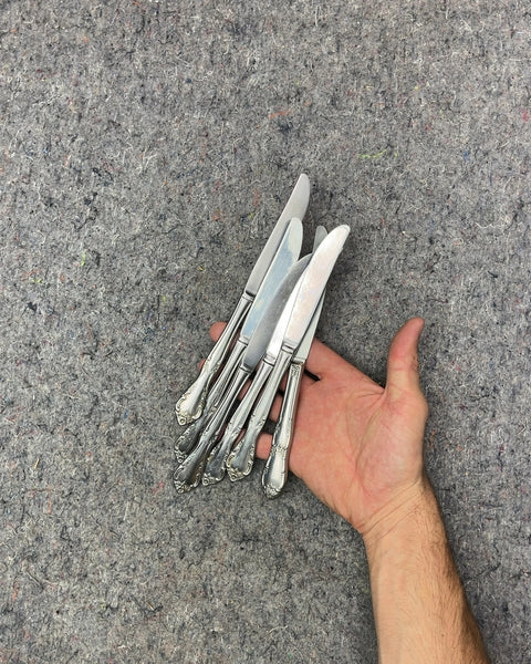 Grip Of Pretty Silverware Knives