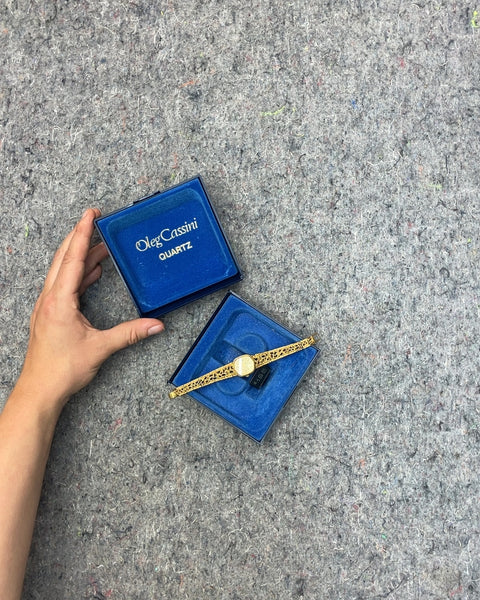 Oleg Cassini Quartz Gold Tone Watch