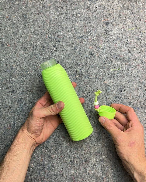 Brand New Glass Water Bottle With Plastic Cover