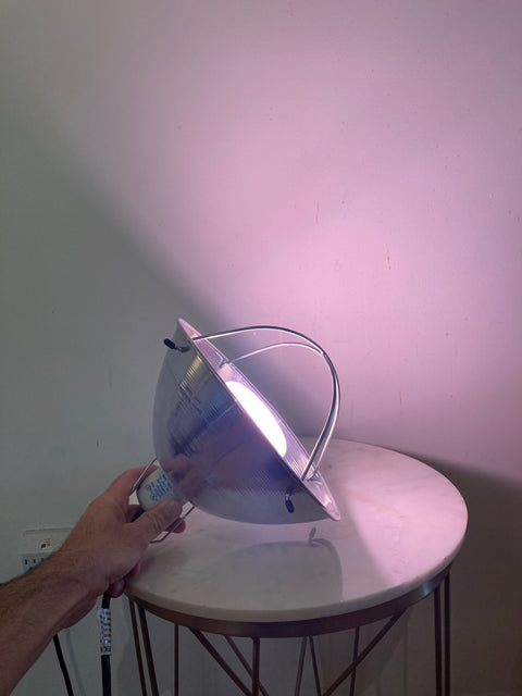 Metal Hanging Lamp With Pinkish Bulb To Grow Plants