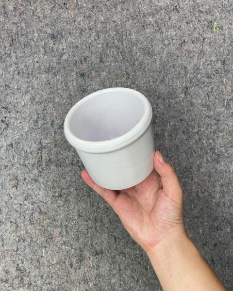 White Ceramic Pot, Has a Storied History As A Pen Holder