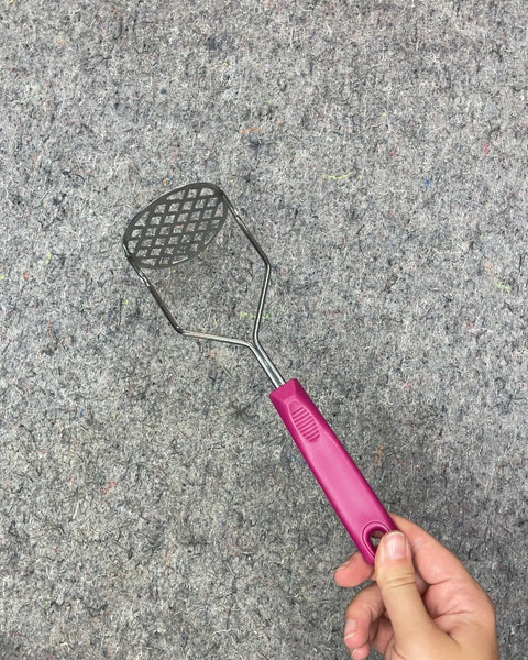 Pink Handle Potato Masher