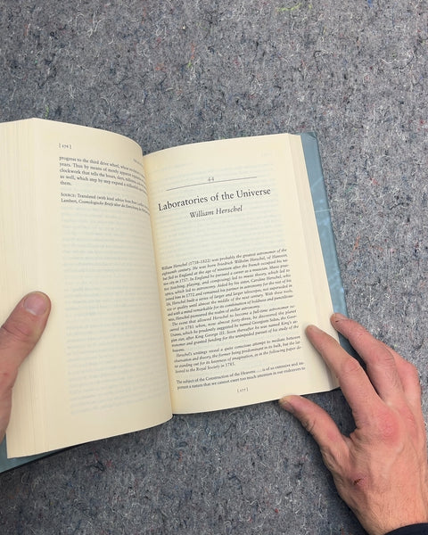 The Book of the Cosmos Hardcover Book by Dennis Richard Danielson