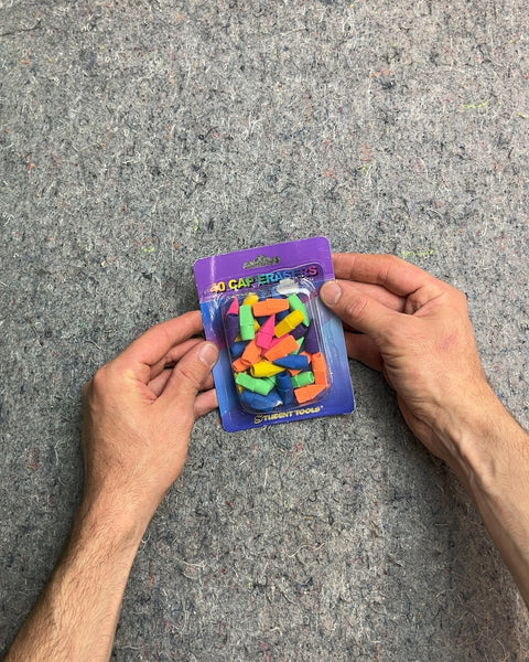 A Whole Bunch Of Colorful Cap Erasers