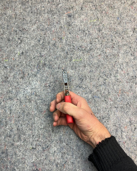 Red Handheld Hole Punch