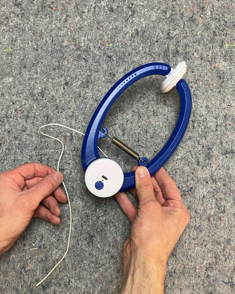 Thing That You Attach To A Door And The Rope Automatically Goes Up And Down And Your Cat Tries To Catch A Toy (Preferably Shaped Like A Mouse) Attached To It