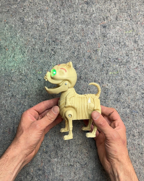 Animated Skeleton Dog With Light-up Green Eyes