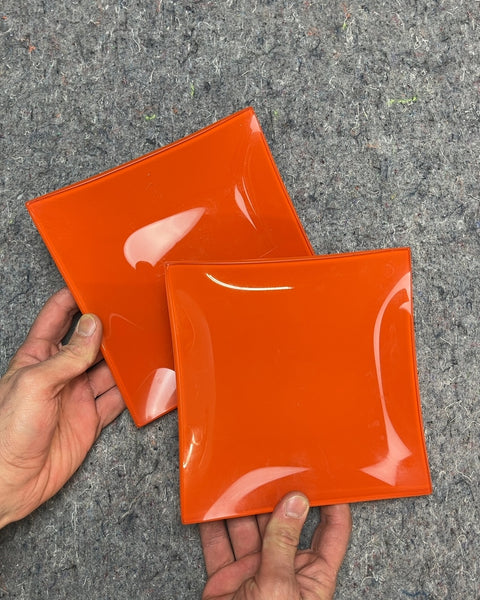 Two Vintage Orange Glass Plates, 7"
