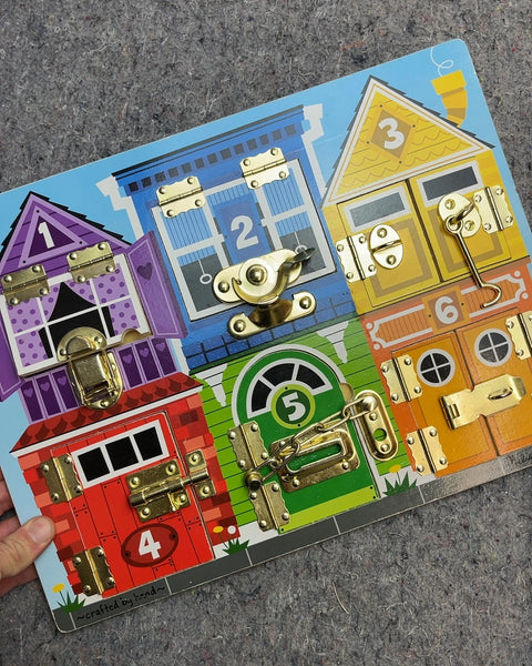 Melissa & Doug Latches Board