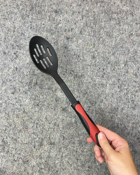 Black Slotted Spoon with Red Handle