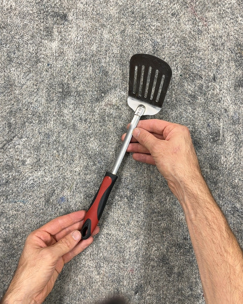 Slotted Spatula with Red and Black Handle
