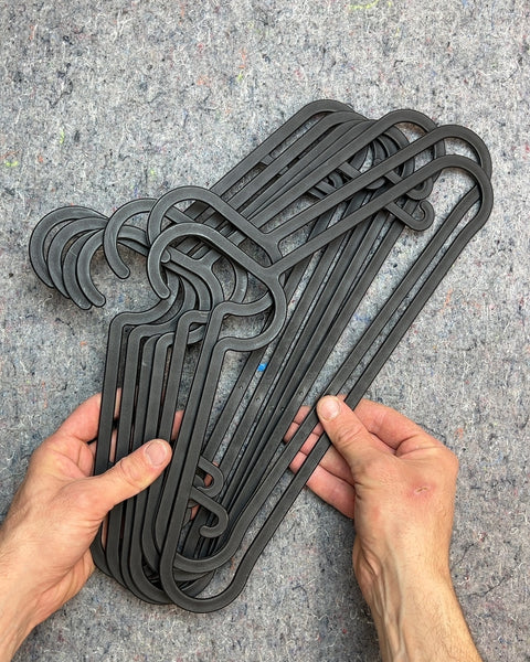 Bunch Of Flat Plastic Clothes Hangers