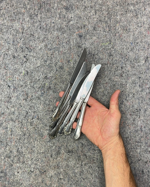 Grip Of Pretty Silverware Knives