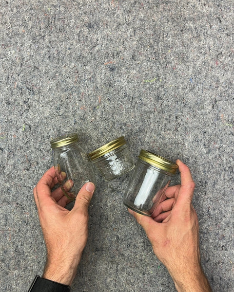 Three Small Glass Jars with Gold Lids