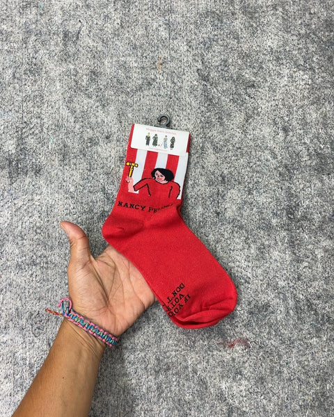 Maggie Stern Stitches Nancy Pelosi Socks