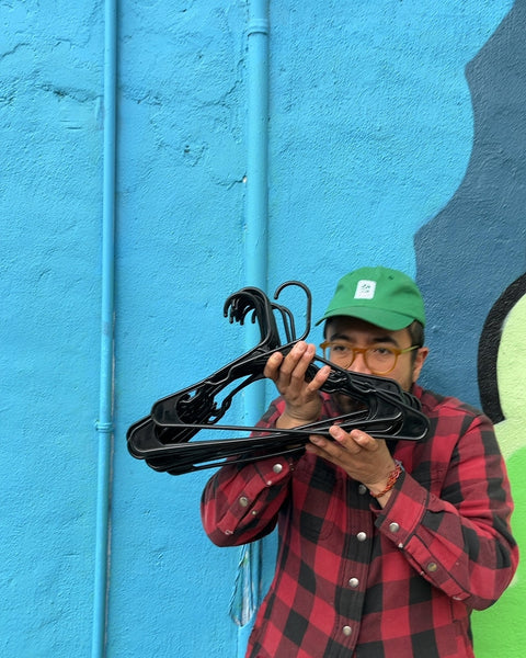 15 Or So Black Plastic Clothes Hangers