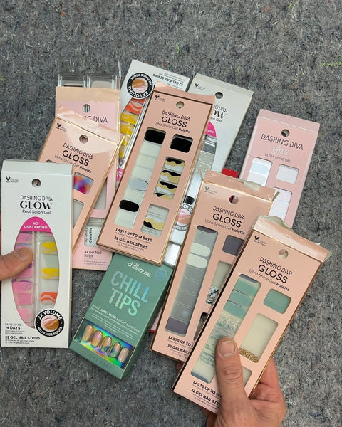 A Whole Bunch Of Nail Strips, Some Open Some Not