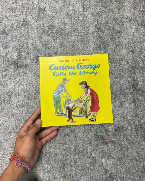 Curious George Visits the Library by Margret & H. A. Rey's