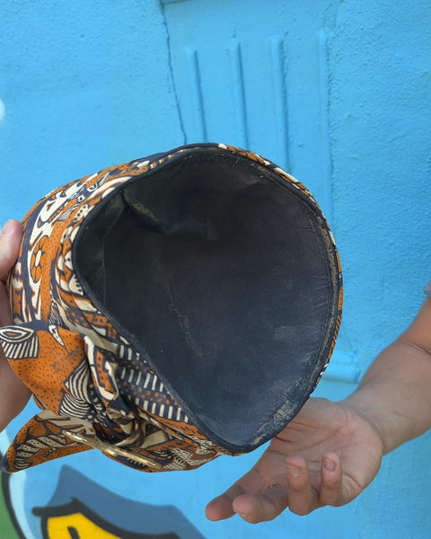 Patterned Fabric Hat with Gold Brooch