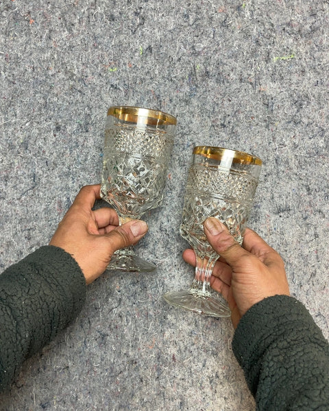 Another Two Embossed Glass Goblets with Gold Trim