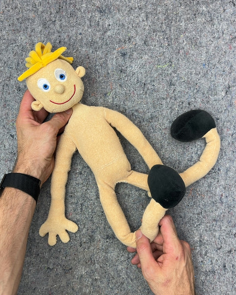 Funky Looking Yellow Haired Plush Doll