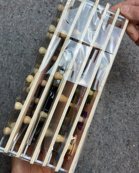 6 Wooden Puzzles & A Rack