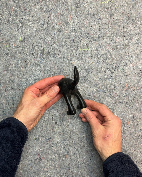 Back Of A Dog Shaped Coat Hanger