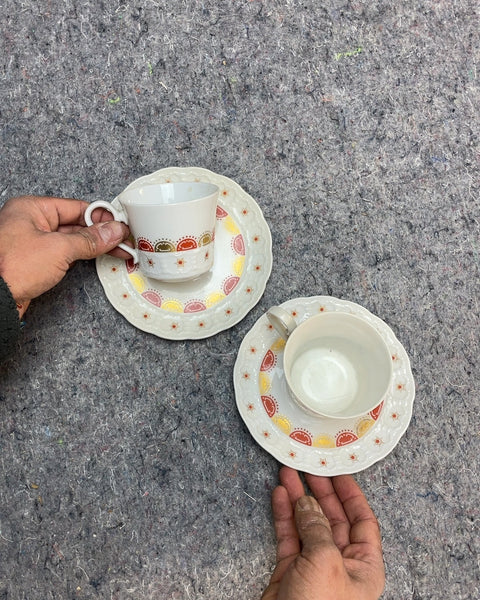 Two Decorative Tea Cups and Saucers