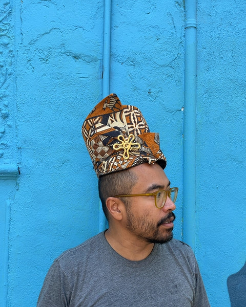 Patterned Fabric Hat with Gold Brooch